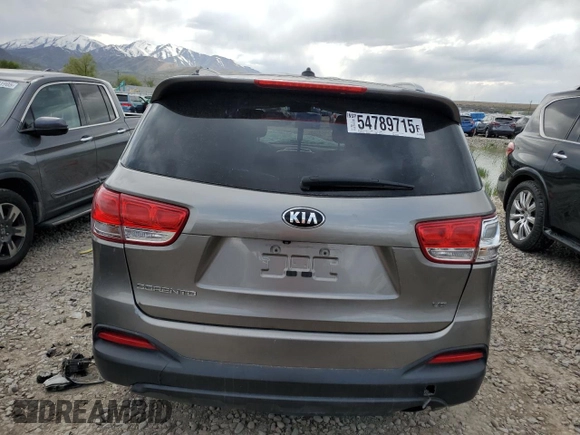 2016 Kia Sorento LX z VIN 5XYPGDA51GG134435, wystawiony jako Copart lot #54789715 z przebiegiem 122 743 mil mil oraz Szkoda całkowita • Salvage title. Historia ofert i sprzedaży dostępna na DreamBid. Obrazek 6.