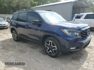 2023 Honda Passport Elite with VIN 5FNYF8H07PB036929, listed as a Copart auction lot 55981185 with 27,523 mi miles and Salvage title. Bid and sale history available at DreamBid. Image 4.