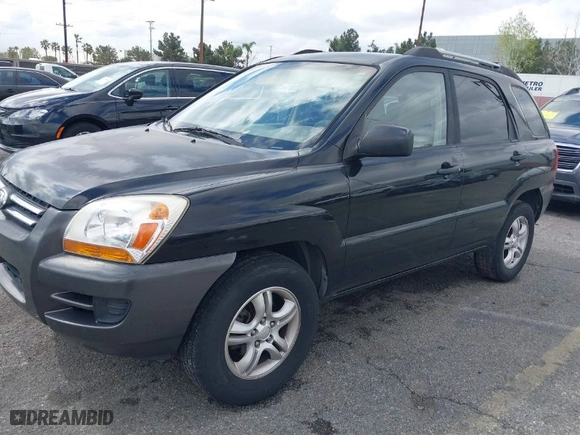 2006 Kia Sportage LX with VIN KNDJF723367279463, listed as a IAAI auction lot 41787584 with 171,271 mi miles. Bid and sale history available at carsss.com. Image 2.