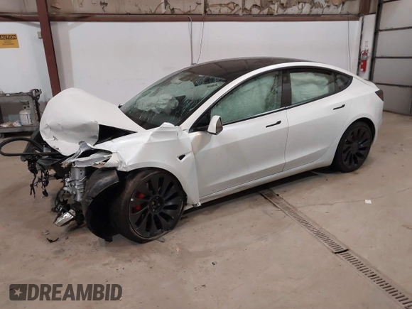 2021 Tesla Model 3 Performance with VIN 5YJ3E1ECXMF991836, listed as a IAAI auction lot 41830519 with Not Provided miles and . Bid and sale history available at carsss.com. Image 2.