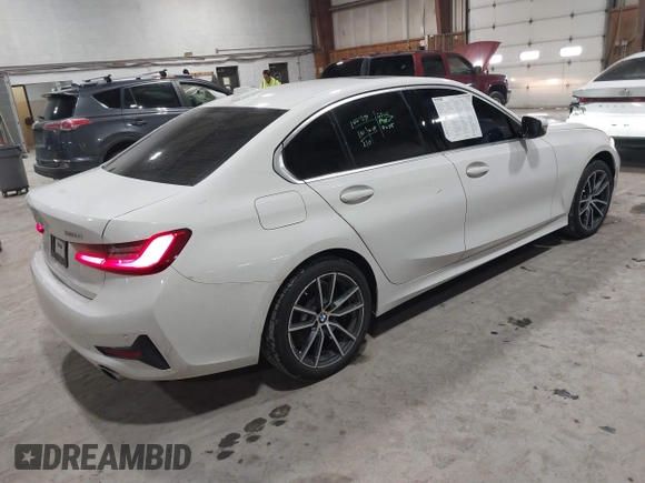 2020 BMW 3 Series 330i xDrive with VIN 3MW5R7J06L8B17690, listed as a IAAI auction lot 41659559 with 74,357 mi miles. Bid and sale history available at carsss.com. Image 4.
