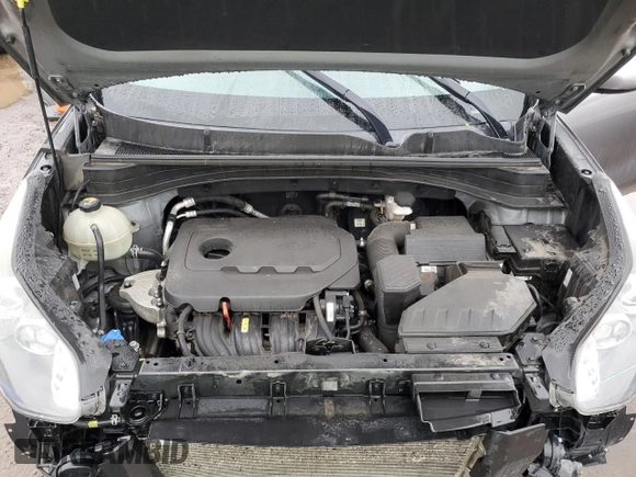 2018 Kia Sportage LX z VIN KNDPMCAC9J7318589, wystawiony jako Copart lot #59397595 z przebiegiem 107 523 mil mil oraz Szkoda całkowita • Salvage title. Historia ofert i sprzedaży dostępna na DreamBid. Obrazek 12.