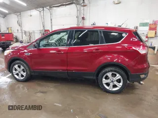 2013 Ford Escape SE with VIN 1FMCU9GX1DUC56361, listed as a IAAI auction lot 42042233 with 136,441 mi miles and . Bid and sale history available at DreamBid. Image 14.