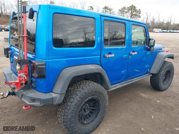2016 Jeep Wrangler Unlimited Rubicon with VIN 1C4BJWFG2GL192074, listed as a IAAI auction lot 41598861 with 70,000 mi miles. Bid and sale history available at carsss.com. Image 4.