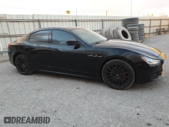 2019 Maserati Ghibli z VIN ZAM57XSA3K1325881, wystawiony jako Copart lot #80973694 z przebiegiem 64 189 mil mil oraz Szkoda całkowita • Salvage title. Historia ofert i sprzedaży dostępna na DreamBid. Obrazek 4.