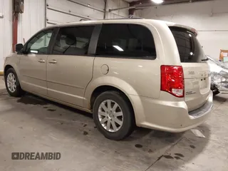 2013 Dodge Grand Caravan SXT with VIN 2C4RDGCG0DR567186, listed as a IAAI auction lot 41706119 with 112,512 mi miles and . Bid and sale history available at DreamBid. Image 3.