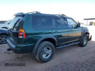 2000 Mitsubishi Montero LS z VIN JA4MT31H0YP015030, wystawiony jako Copart lot #83232584 z przebiegiem 75 294 mil mil oraz Szkoda całkowita • Salvage title. Historia ofert i sprzedaży dostępna na DreamBid. Obrazek 3.