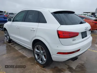 2016 Audi Q3 Premium Plus with VIN WA1EFCFS7GR007879, listed as a IAAI auction lot 41861100 with 99,338 mi miles and . Bid and sale history available at DreamBid. Image 3.