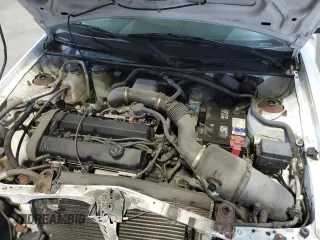 2000 Ford Escort ZX2 z VIN 3FAKP1131YR189603, wystawiony jako Copart lot #58669905 z przebiegiem 72 791 mil mil oraz Czysty tytuł • Clean title. Historia ofert i sprzedaży dostępna na DreamBid. Obrazek 11.