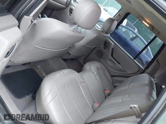 2004 Jeep Grand Cherokee Laredo with VIN 1J4GW48S24C276284, listed as a IAAI auction lot 42596655 with 142,524 mi miles and . Bid and sale history available at DreamBid. Image 17.
