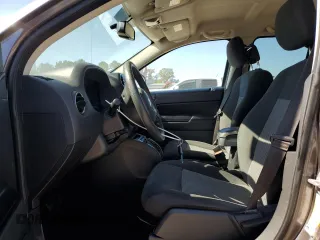 2017 Jeep Compass Sport with VIN 1C4NJCBA2HD147418, listed as a Copart auction lot 76757094 with 125,947 mi miles and Salvage Title. Bid and sale history available at carsss.com. Image 7.