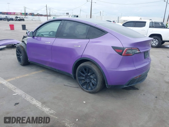 2021 Tesla Model Y Long Range with VIN 5YJYGDEE7MF224531, listed as a IAAI auction lot 38454442 with 52,408 mi miles. Bid and sale history available at carsss.com. Image 3.