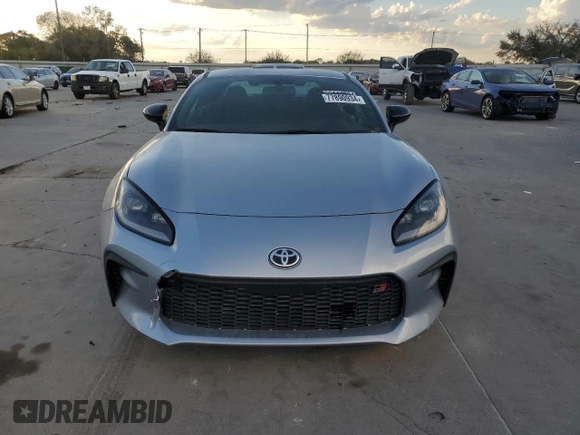 2023 Toyota GR86 with VIN JF1ZNBC17P8760338, listed as a Copart auction lot 77890934 with 0 mi miles and Salvage Title. Bid and sale history available at carsss.com. Image 5.
