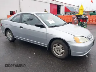 2001 Honda Civic LX with VIN 1HGEM21521L057706, listed as a IAAI auction lot 41306686 with 136,385 mi miles. Bid and sale history available at carsss.com. Image 1.