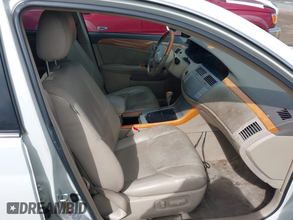 2005 Toyota Avalon XL z VIN 4T1BK36B35U023068, wystawiony jako IAAI lot #41920638 z przebiegiem 196 001 mil mil oraz . Historia ofert i sprzedaży dostępna na DreamBid. Obrazek 5.