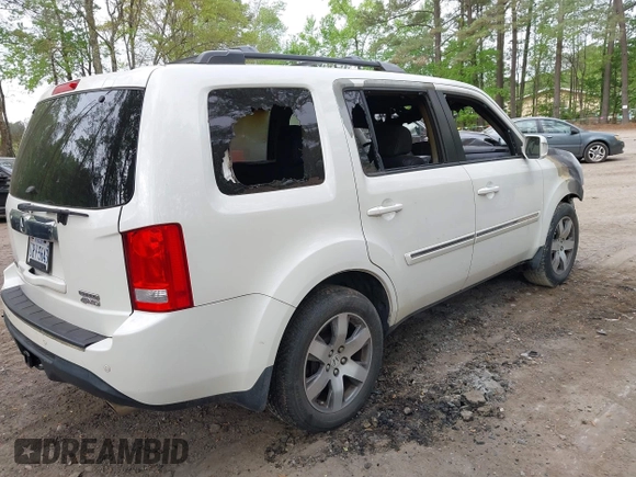 2014 Honda Pilot Touring z VIN 5FNYF4H93EB022045, wystawiony jako IAAI lot #42060815 z przebiegiem Nie podano mil oraz . Historia ofert i sprzedaży dostępna na DreamBid. Obrazek 4.