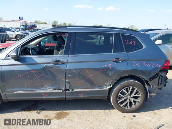 2020 Volkswagen Tiguan SE with VIN 3VV3B7AXXLM137641, listed as a IAAI auction lot 41830400 with 68,067 mi miles and . Bid and sale history available at DreamBid. Image 18.
