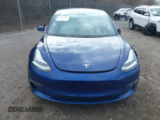 2020 Tesla Model 3 Long Range with VIN 5YJ3E1EB9LF601198, listed as a IAAI auction lot 41744287 with 70,322 mi miles and . Bid and sale history available at DreamBid. Image 13.