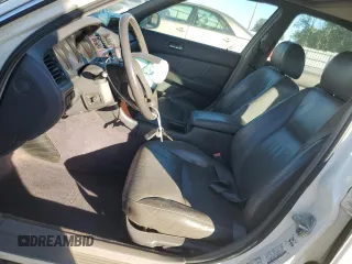 1999 Acura RL with VIN JH4KA9657XC008942, listed as a Copart auction lot 75336774 with 0 mi miles and Salvage Title. Bid and sale history available at carsss.com. Image 7.