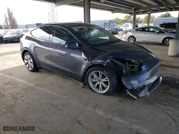 2023 Tesla Model Y Long Range with VIN 7SAYGDEEXPA137582, listed as a Copart auction lot 46869265 with 16,474 mi miles and Salvage Title. Bid and sale history available at carsss.com. Image 4.