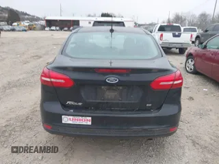 2017 Ford Focus SE with VIN 1FADP3F2XHL269548, listed as a IAAI auction lot 41304096 with 159,085 mi miles and . Bid and sale history available at DreamBid. Image 16.