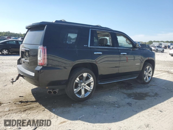 2018 GMC Yukon SLT with VIN 1GKS1BKC9JR108210, listed as a Copart auction lot 50465765 with 106,542 mi miles and Salvage Title. Bid and sale history available at carsss.com. Image 3.