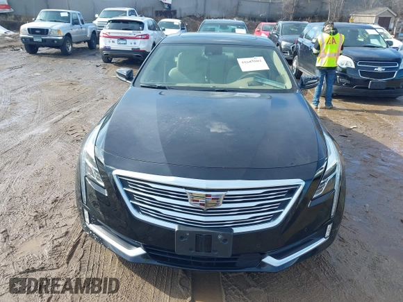 2017 Cadillac CT6 Platinum AWD z VIN 1G6KN5R64HU175275, wystawiony jako IAAI lot #41683802 z przebiegiem 75 604 mil mil oraz . Historia ofert i sprzedaży dostępna na DreamBid. Obrazek 12.