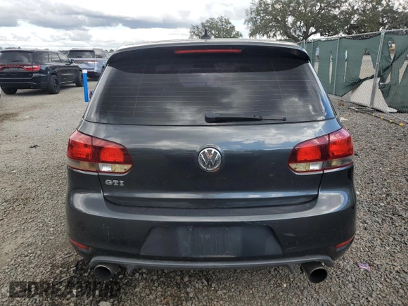 2010 Volkswagen GTI with VIN WVWHV7AJ6AW090189, listed as a Copart auction lot 80183584 with 141,741 mi miles and Salvage Title. Bid and sale history available at carsss.com. Image 6.