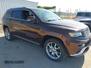 2015 Jeep Grand Cherokee Summit with VIN 1C4RJFJGXFC125131, listed as a IAAI auction lot 42475017 with 128,166 mi miles and . Bid and sale history available at DreamBid. Image 1.