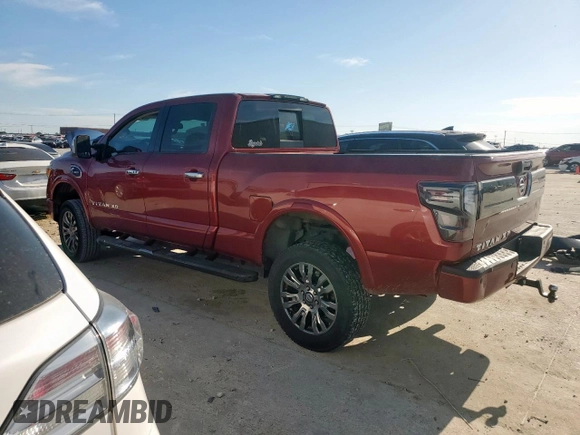 2016 Nissan Titan SV with VIN 1N6BA1F28GN505671, listed as a Copart auction lot 57512795 with 110,050 mi miles and Clean title. Bid and sale history available at DreamBid. Image 2.