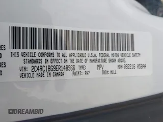 2014 Chrysler Town & Country Touring with VIN 2C4RC1BG9ER148966, listed as a IAAI auction lot 41886625 with 104,299 mi miles. Bid and sale history available at carsss.com. Image 9.