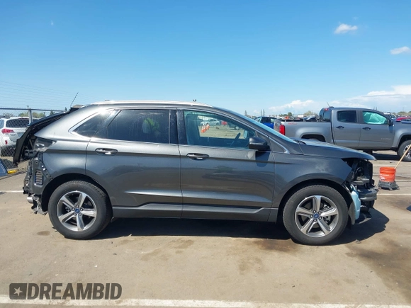 2019 Ford Edge SEL z VIN 2FMPK3J92KBC63577, wystawiony jako IAAI lot #41948953 z przebiegiem 72 551 mil mil oraz . Historia ofert i sprzedaży dostępna na DreamBid. Obrazek 14.