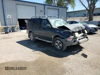 2001 Nissan Xterra XE with VIN 5N1ED28T01C522269, listed as a Copart auction lot 56997515 with 103,800 mi miles and Salvage title. Bid and sale history available at DreamBid. Image 14.