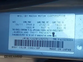 2011 Mazda Mazda3 i Sport with VIN JM1BL1UG2B1492573, listed as a IAAI auction lot 41718773 with 151,593 mi miles. Bid and sale history available at carsss.com. Image 9.