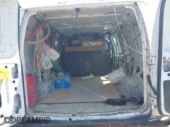 2013 Ford Econoline Cargo Commercial with VIN 1FTNE1EW1DDA62354, listed as a IAAI auction lot 41988842 with 118,614 mi miles and . Bid and sale history available at carsss.com. Image 8.