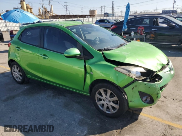 2011 Mazda 2 Touring z VIN JM1DE1HZ4B0115764, wystawiony jako Copart lot #56161455 z przebiegiem 134 274 mil mil oraz Szkoda całkowita • Salvage title. Historia ofert i sprzedaży dostępna na DreamBid. Obrazek 4.