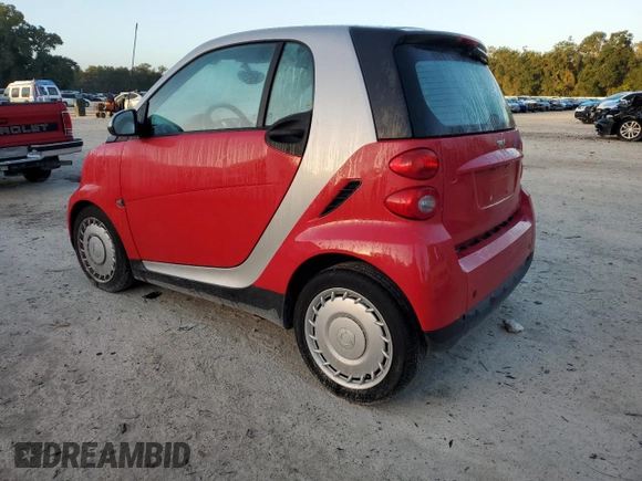 2011 Smart fortwo Pure с VIN WMEEJ3BAXBK421243, выставлен на аукционе Copart как лот 78536584 с пробегом 64 858 миль миль и На запчасти • Non repairable. История ставок и продаж доступна на DreamBid. Изображение 2.