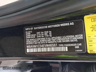 2014 BMW X1 sDrive28i with VIN WBAVM1C54EVW46561, listed as a IAAI auction lot 41880387 with 125,096 mi miles. Bid and sale history available at carsss.com. Image 9.