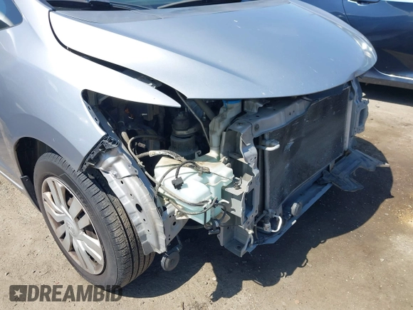 2017 Honda Fit LX with VIN JHMGK5H51HS023212, listed as a IAAI auction lot 42153107 with 106,778 mi miles. Bid and sale history available at carsss.com. Image 19.