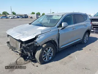2020 Hyundai Santa Fe SE z VIN 5NMS2CAD1LH221326, wystawiony jako IAAI lot #42442177 z przebiegiem 68 995 mil mil oraz . Historia ofert i sprzedaży dostępna na DreamBid. Obrazek 2.