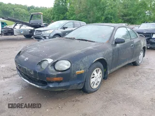 1995 Toyota Celica ST with VIN JT2AT00F7S0040443, listed as a IAAI auction lot 42125327 with 286,767 mi miles. Bid and sale history available at carsss.com. Image 2.