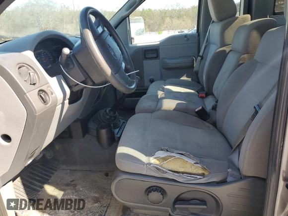 2006 Ford F-150 XL with VIN 1FTRF12286NA28327, listed as a Copart auction lot 46811965 with 139,569 mi miles and Salvage title. Bid and sale history available at DreamBid. Image 7.
