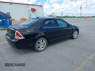 2007 Ford Fusion SEL with VIN 3FAHP08177R275294, listed as a IAAI auction lot 39447301 with 211,258 mi miles. Bid and sale history available at carsss.com. Image 4.