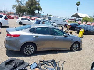 2018 Kia Optima LX with VIN 5XXGT4L34JG266575, listed as a IAAI auction lot 42458844 with 73,394 mi miles and . Bid and sale history available at DreamBid. Image 13.