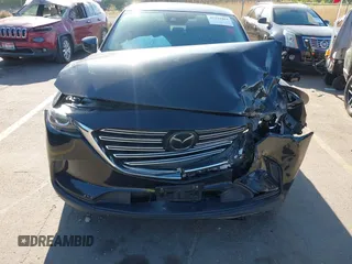 2018 Mazda CX-9 Sport with VIN JM3TCBBY6J0222750, listed as a IAAI auction lot 42294464 with 63,927 mi miles and . Bid and sale history available at DreamBid. Image 12.