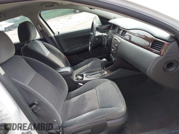 2014 Chevrolet Impala LS with VIN 2G1WA5E38E1141734, listed as a IAAI auction lot 41942551 with 110,805 mi miles and . Bid and sale history available at DreamBid. Image 5.