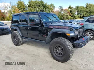 2023 Jeep Wrangler Rubicon with VIN 1C4HJXFN4PW636133, listed as a Copart auction lot 75499614 with 13,252 mi miles and Salvage title. Bid and sale history available at DreamBid. Image 4.