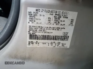 2002 Ford Excursion XLT with VIN 1FMNU41S22EC86209, listed as a Copart auction lot 51261065 with 202,942 mi miles and Salvage title. Bid and sale history available at DreamBid. Image 13.