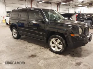 2014 Jeep Patriot Limited with VIN 1C4NJRCB0ED928766, listed as a IAAI auction lot 42437880 with 135,443 mi miles and . Bid and sale history available at DreamBid. Image 1.