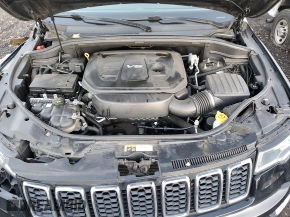 2017 Jeep Grand Cherokee Altitude with VIN 1C4RJFAG1HC959193, listed as a Copart auction lot 84899534 with 91,490 mi miles and Salvage title. Bid and sale history available at DreamBid. Image 12.